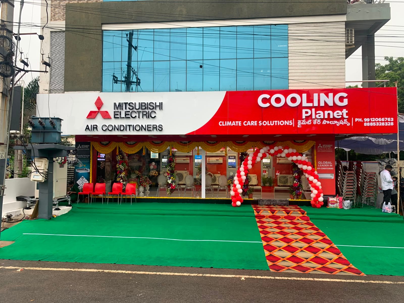 Cooling Planet × Mitsubishi Electric — ACP LED · dealer façade